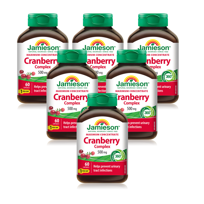 Multiple bottles of Jamieson Cranberry Complex on a white background